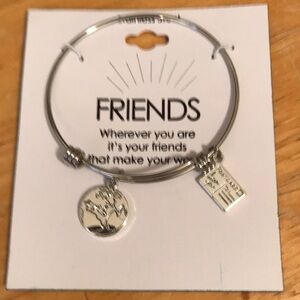Friends bracelet with two charms, stainless steel, new on card. Lot S